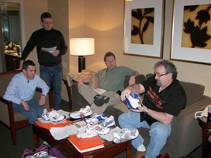 Dr. Mark Reeves, far right, explains the Academy shoe evaluation process that he originated, to shoe committee members (L to R) Drs. David Levine, Lance Greiff and Paul Cannon.