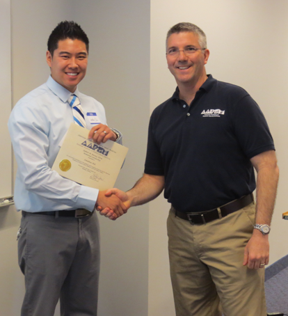 Jonathan Shih (left) a 2nd year student at The Arizona School of Podiatric Medicine (AZPOD) is presented the Robert M. Barnes, DPM Memorial Scholarship by current AAPSM President Rob Conenello, DPM (right) at the AAPSM Day of Sports Medicine held April 13 at AZPOD. The award is presented to an AAPSM Student Chapter Member who has made significant contributions to podiatric sports medicine. Jon is the 24th recipient of this Award.