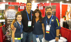 Amanda Yates, Tony Gonzalez, Tight End for the Atlanta Falcons; Rita Yates, and AAPSM Past President Tim Dutra stop for a photo at the recent NATA Annual Meeting in Philadelphia, PA